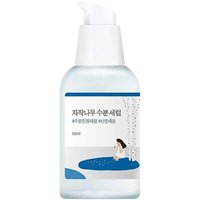 Clear bottle with white pump, blue label featuring birch trees, Round Lab Birch Juice Moisturizing Serum 50 ml.