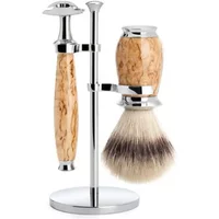 Mühle Bouleau safety razor kit with birch wood handle, chrome accents, shaving brush, and stand.