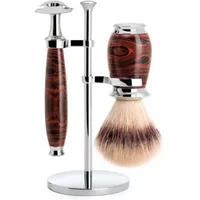 Mühle Ebonite safety razor kit with dark wood grain handle, chrome stand, and matching shaving brush.