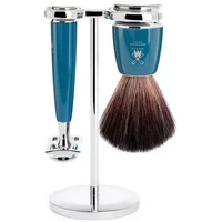 Blue Mühle Rytmo safety razor kit with brush and stand, featuring chrome accents and sleek modern design.