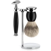 Mühle Sophist Pur safety razor kit with black handle, silver stand, and shaving brush with black and silver accents.