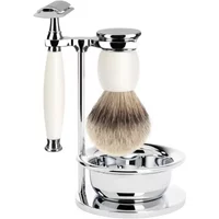 Chrome and ivory safety razor kit with brush, stand, and bowl, featuring sleek modern design.