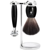 Mühle Vivo safety razor kit with black handle, brush, and chrome stand.