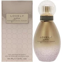 Gold teardrop perfume bottle with textured cap, labeled "Lovely You" by Sarah Jessica Parker, next to matching box.