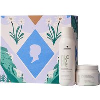 Schwarzkopf Blondme Repair Set with white shampoo bottle and cream jar, in a floral-patterned box.