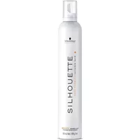 White Schwarzkopf Silhouette Flexible Hold Mousse can, 500ml, with black text and orange accents.