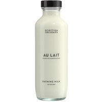 Clear bottle of Scottish Fine Soaps Au Lait Bathing Milk with black cap and minimalist label design.