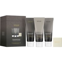 Scottish Fine Soaps Oakmoss gift set with dark grey tubes and a white soap bar in elegant packaging.