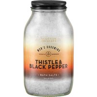Glass jar of Scottish Fine Soaps Thistle & Black Pepper Bath Salts, 500g, with black lid and gradient label.