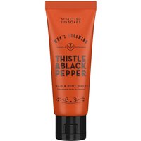 Orange tube of Scottish Fine Soaps Thistle & Black Pepper Hair & Body Wash, black cap, bold black text.