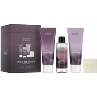 Scottish Fine Soaps Wild Heather set with purple tubes, clear bottle, and soap bar in elegant packaging.