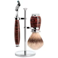 Shaving kit with ebonite handle razor, matching brush, and chrome stand, featuring a sleek, polished finish.