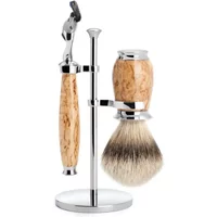 Shaving kit with birch wood handles, chrome stand, Fusion razor, and badger hair brush.