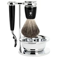 Shaving kit with black-handled razor, silver stand, brush, and chrome bowl by Mühle Rytmo Mach3 Pur.