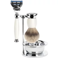 Mühle Sophist Fusion shaving kit with white handle razor, matching brush, chrome stand, and bowl.