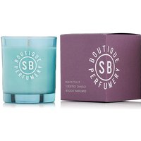 Shay & Blue Black Tulip candle in a turquoise glass jar with a purple box featuring white branding.