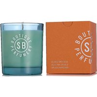 Blue glass candle with white logo, orange box beside it labeled "Blood Oranges" by Shay & Blue.
