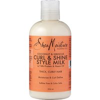 Shea Moisture Curl & Shine Style Milk in a 254ml bottle with orange label and black text, for thick, curly hair.