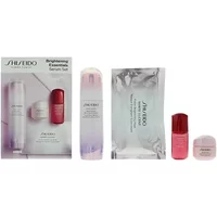 Shiseido gift set with white and pink bottles, brightening mask, and branded packaging.