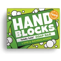 Shower Blocks Hand Blocks soap bar in green packaging with lime and sandalwood text, bubble graphics, palm oil free badge.