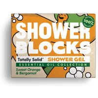 Shower Blocks solid shower gel box with orange, bergamot design, and bold white text on an orange background.