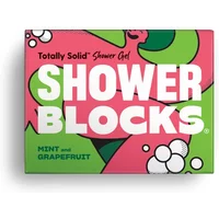 Shower Blocks solid shower gel in pink and green box with bold white text, mint and grapefruit scent.