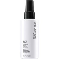 White Shu Uemura Izumi Tonic Strengthening Serum bottle with black pump and minimalist text design, 90ml.