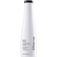 White Shu Uemura Izumi Tonic Strengthening Shampoo bottle, 300ml, with black cap and minimalist text design.