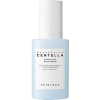 Skin1004 Hyalu-Cica Blue Serum in a frosted blue bottle with white cap and minimalist black text.
