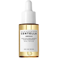 Clear glass bottle with white dropper cap, labeled "Madagascar Centella Ampoule" by SKIN1004, 30 ml.