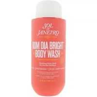Orange Sol de Janeiro Bom Dia Bright Body Wash bottle with white cap, 385ml, featuring white text and floral accents.