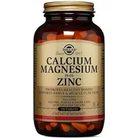 Brown bottle of Solgar Calcium Magnesium Plus Zinc tablets with gold label and black cap.