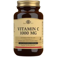 Brown bottle of Solgar Vitamin C 1000 mg, gold cap, beige label with black text, pack of 100 vegetable capsules.