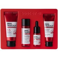 Red and white Snail Truecica face kit with cleanser, toner, serum, and cream in a red tray.