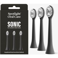 Black Sonic toothbrush replacement heads with white bristles, shown with Spotlight Oral Care packaging.