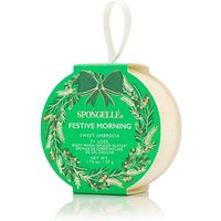 Green circular Spongellé body wash buffer with festive wreath design and white hanging ribbon.