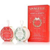 Spongellé gift set with red and white body buffers, festive wreath design, and red box labeled "Home & Hearth, Golden Pear."