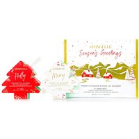 Spongellé gift set with tree-shaped red and white body wash buffers, festive packaging with holiday village design.