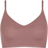 Sloggi Adapt sports bra in mauve, seamless design with adjustable thin straps and smooth fabric finish.