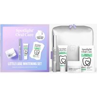 Spotlight Oral Care Little Luxe Whitening Gift Set with toothpaste, whitening strips, and silver travel case.
