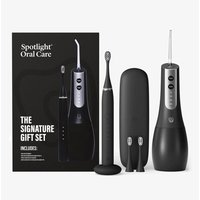 Spotlight Oral Care gift set with black Sonic Pro toothbrush, UV water flosser, and travel case.