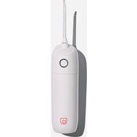 White Spotlight Oral Care water flosser with UV steriliser, sleek design, single button, and logo at the base.