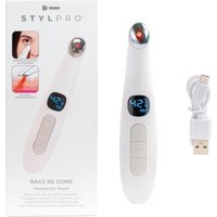 White StylPro eye massager with digital display, rounded metal tip, and USB charging cable.