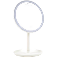 StylPro Melody rechargeable Bluetooth mirror with round LED-lit frame on white stand and base.