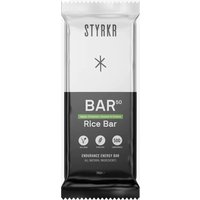 STYRKR BAR50 energy bar in white wrapper with black label, featuring apple, cinnamon, caramel, and sultana flavors.