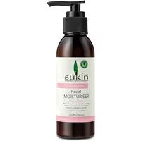 Brown bottle with black pump, Sukin Sensitive Facial Moisturiser label, green leaf logo, pink accent stripe.