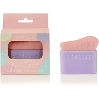 Sunkissed Face & Body Tanning Brush with pink bristles and purple handle, packaged in a pastel box.