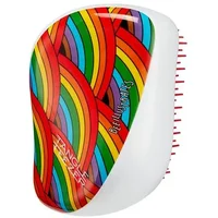 Compact detangling hair brush with vibrant rainbow swirl design and white base, featuring pink bristles.