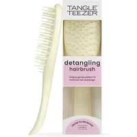 Tangle Teezer chamomile detangling hairbrush with soft cream bristles and ergonomic handle in branded packaging.
