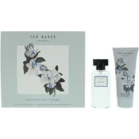 Ted Baker Amelia gift set with white perfume bottle, black cap, and matching floral hand cream tube in a floral box.